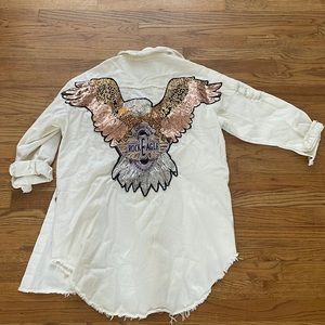 Long white jean jacket with logo on back